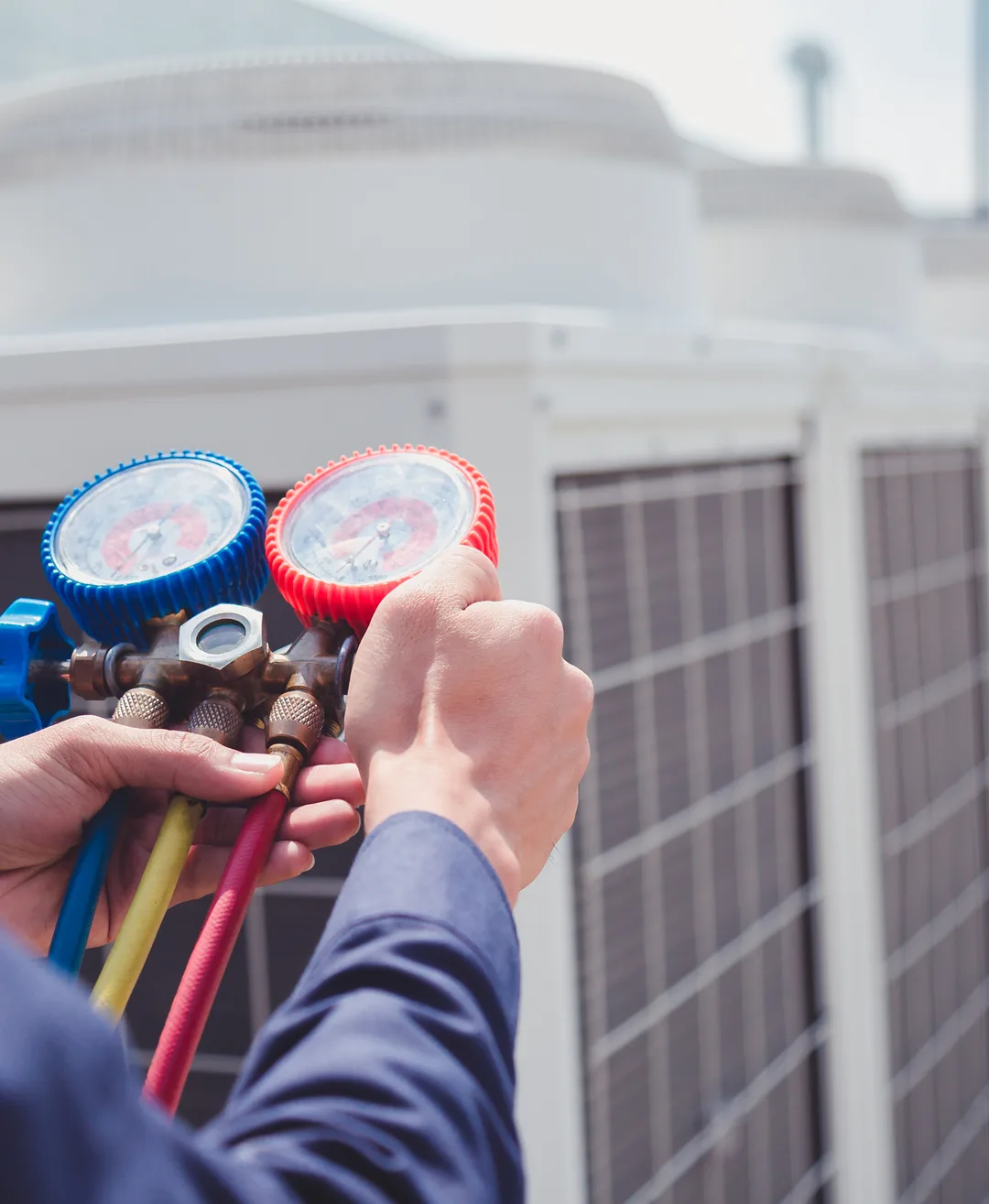 Plain View Solutions technician servicing an air conditioning system