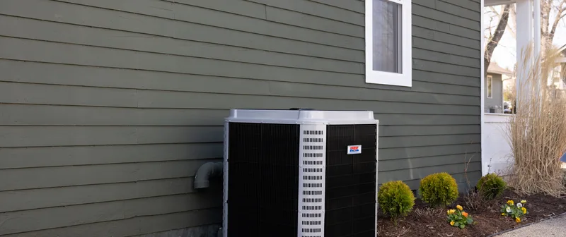 Outdoor heat pump unit serviced by Plain View Solutions